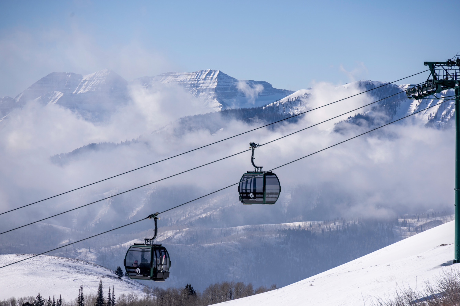 Deer Valley gondolas with Mount Timpanogos behind